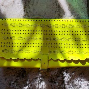 NWOT. Neon Eyelet Clutch